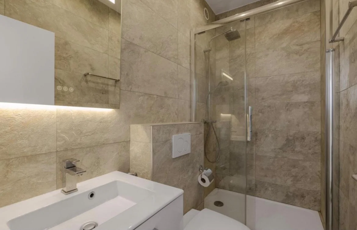 Marble bathroom with walk-in shower