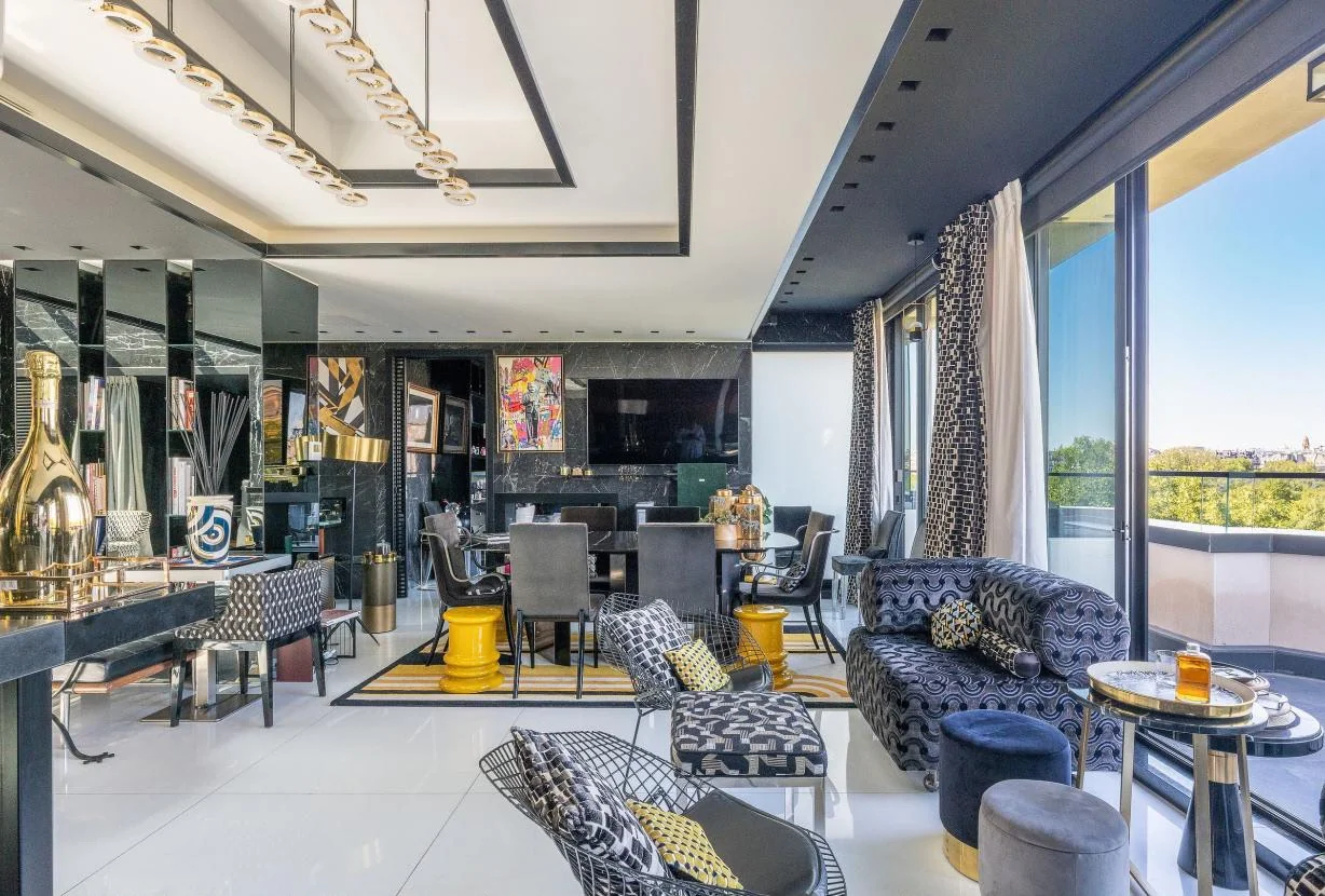 Large panoramic living room under glass roof