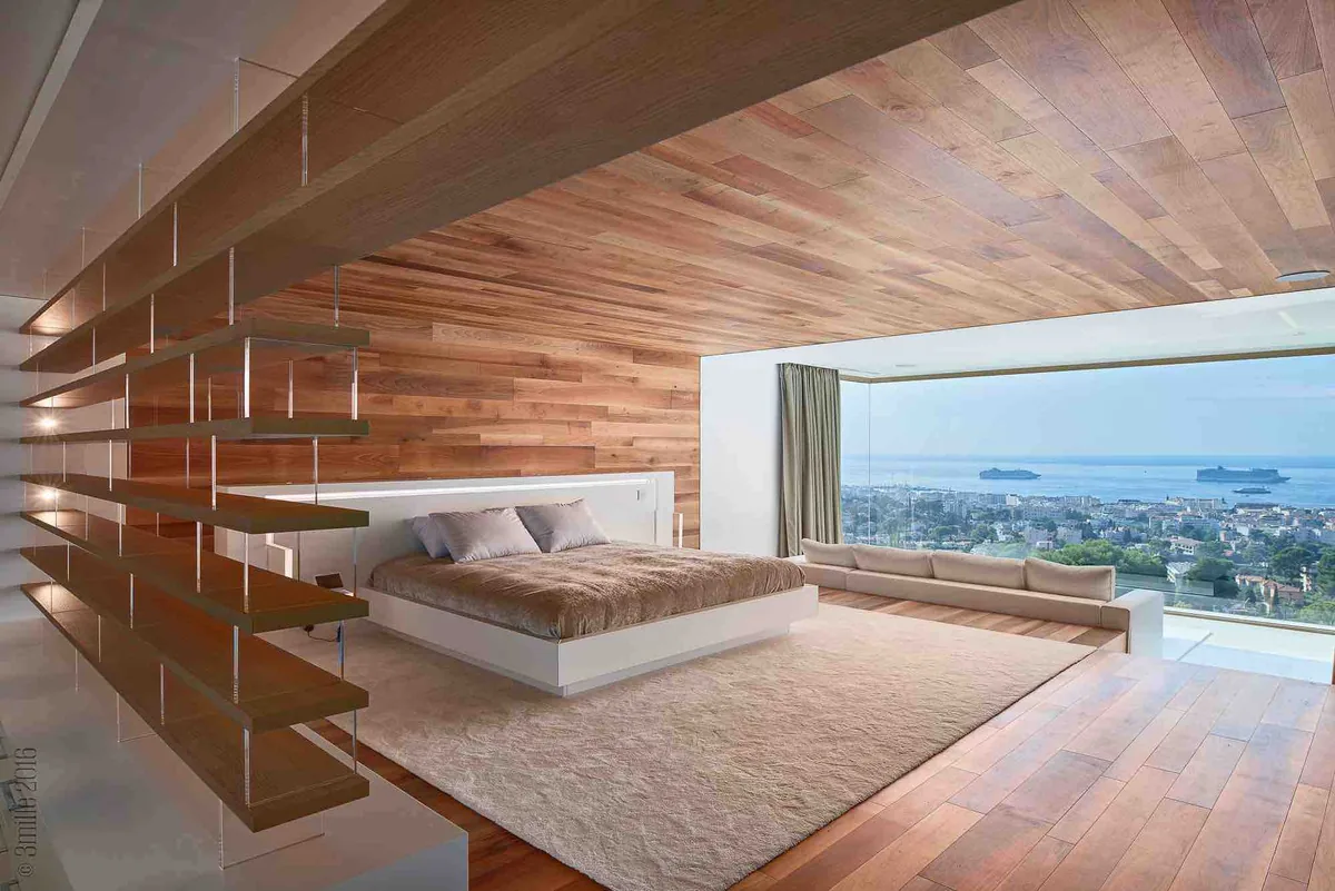 Suite maître bois clair, lit et terrasse vue mer panoramique