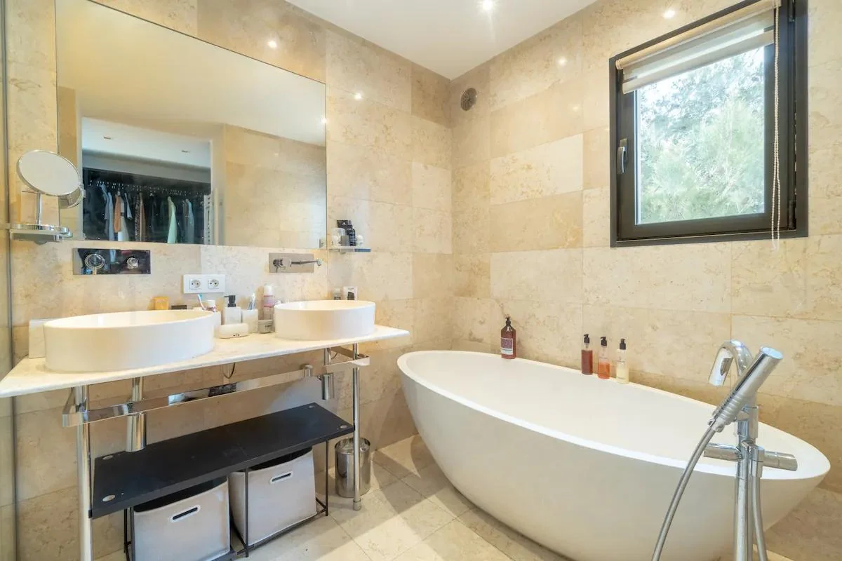 Marble bathroom with freestanding bathtub